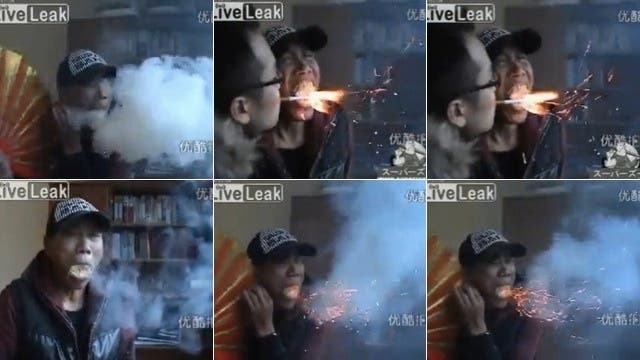 chinese man breathes smoke and fire video